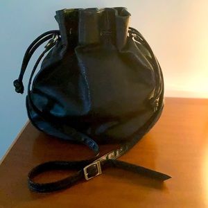 Black leather Saddle River Drawstring Bucket Handbag